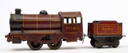 A Wells-Brimtoy No335 clockwork tinplate 0-4-0 locomotive and tender '7040':,