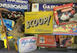 Two trunks containing assorted children's games and board games: all playworn.