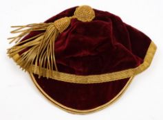 An early 20th century claret and gold sporting cap by Veasey and Son:.
