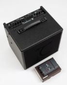 A Tanglewood T6 acoustic amplifier and AKG microphone:.