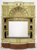 A Victorian style model of a theatrical stage: painted light green with balconies to either side,