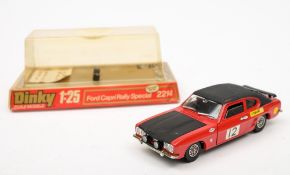 A Dinky (1/24th scale) 2214 Ford Capri Rally Special:, red body, black interior, roof and bonnet,