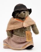 A Paddington's Aunt Lucy bear by Gabrielle Designs:, with original luggage label, hat and glasses,