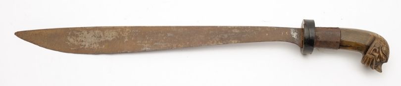 A late 19th century Indonesian short sword:,