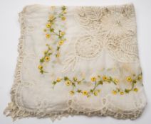An early 20th century silk and lace embroidered bedspread:,