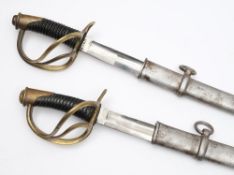 A pair of 19th century light cavalry sabres:,
