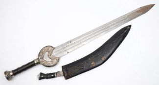 A decorative Celtic style prop sword and a kukri:, (2).