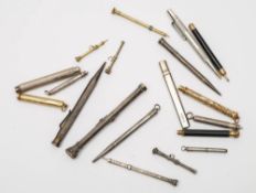 A collection of silver and silver plated and gold plated propelling pencils and fob pencils:,