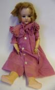 An Armand Marseille bisque head doll: impressed Made in Germany. Armand Marseille. 390. A.6.M.