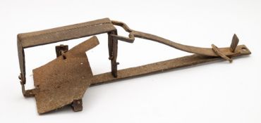 A 19th century iron man/bear trap of typical form:, 70 cm long.