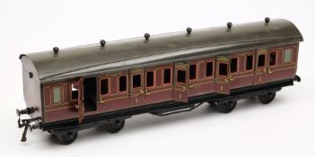 Basset Lowke, a gauge 1, 1st class corridor coach: in Midland maroon livery.