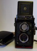 A Yashica 124G - twin reflex camera: and case.