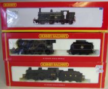 Hornby, a 4-4-0 locomotive No 579 with six wheel tender: in LMS black livery,