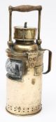 A brass lighthouse lamp by Bulpitt & Sons,