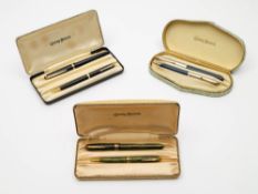 A boxed Conway Stewart '57' fountain pen and '44' propelling pencil in blue,