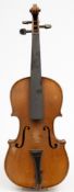 An early 20th century student violin and bow in an ebonised case:, the violin with scroll headstock,