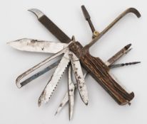 A 19th century coachman's knife with fifteen implements:, unsigned, the combination including,