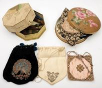 An early 20th century silk peacock embroidered evening bag,