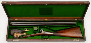 A cased side by side double barrel percussion shotgun by Smith:,