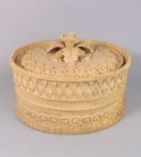 A Davenport cane ware pie dish and cover: of oval form moulded with faux pastry designs and notched