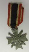 A Third Reich period War Merit Cross with swords: