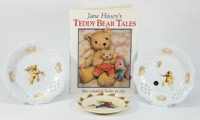 A pair of German porcelain ribbon plates with bear transfer print decoration:, 20cm.