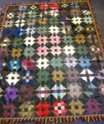 A 19th century double-sided patchwork quilt: one side with all over geometric pattern decoration