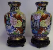 A pair of 20th century Chinese cloisonne vases: of squat globular form decorated all over with
