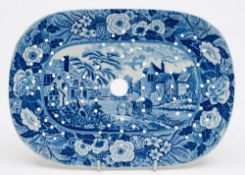 Three unattributed pearl glazed transfer decorated blue and white strainers: of oval form,