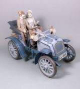 A Lladro porcelain figure group Motoring in Style (No.