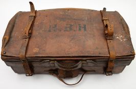 A brown leather travelling suitcase by The Army & Navy Co-operative, London:,