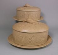 Two graduating cane ware pie dishes,
