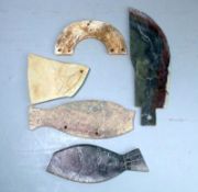 A group of five Chinese carved hardstone items in archaic style: including two blades and three