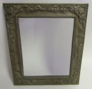 An Eastern European white metal easel dressing table mirror: of rectangular outline,