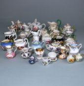 A mixed group of miniature porcelain jugs, bowls,