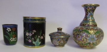 A champleve enamel vase: with peony scroll decoration,