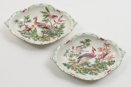 A pair of Chelsea porcelain dishes: of navette form each decorated in colours with fancy birds in a