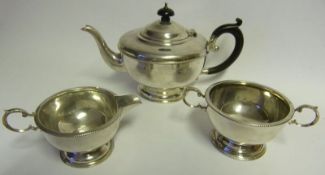 A George V silver three-piece tea service, maker Marson & Jones, Birmingham,