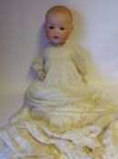 An Armand Marseille bisque head doll: impressed AM Germany.