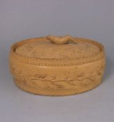 An unusual cane ware pie dish and cover: of oval form each applied with an encircling band of soft