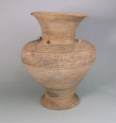 A Middle Eastern grey pottery vase: incised and moulded with elephants and foliate motifs,