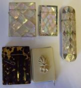 A collection of four Victorian card cases: and a mother of pearl spectacle case.