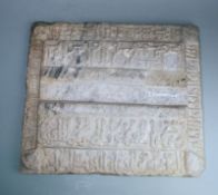 An Islamic stone panel: carved with six lines of inscriptions, 40 x 46 cm [some damage and losses].