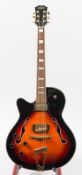 A left handed semi- acoustic electric guitar by Stagg:,