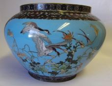 A large late 19th century cloisonne jardiniere: decorated with ducks and finches amongst flowering