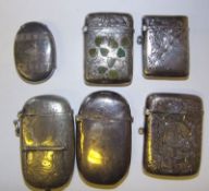 A group of four silver vesta cases: and two plated examples, weighable silver 3.51ozs.