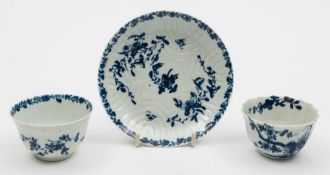 An early Worcester blue and white feather moulded teabowl and saucer and a similar faceted teabowl: