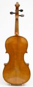 An early 20th century student violin and bow in an ebonised case:, the violin with scroll headstock,