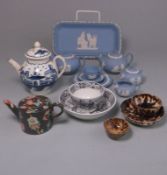 A mixed group of toy and miniature pottery items: comprising two Wheildon tea bowls and a saucer,