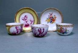 Two miniature Meissen cups and saucer and a further cup: one painted with garden flowers within a